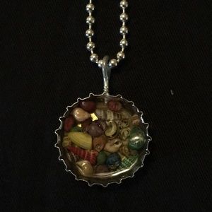 Unique bottle cap necklace.